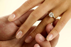 Woman Receiving Engagement Ring